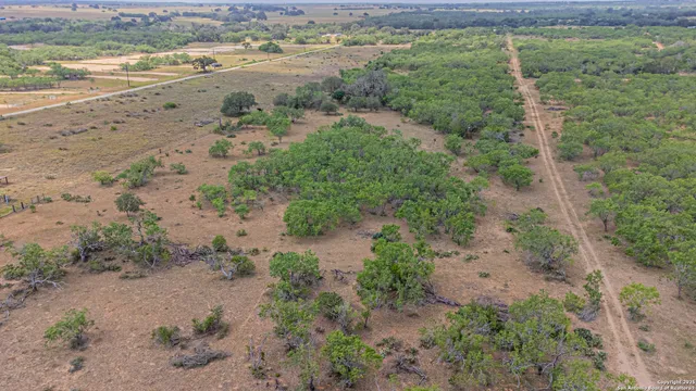 an aerial view of beach and space