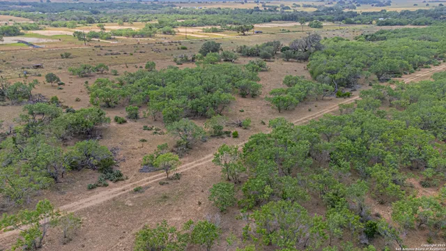 an aerial view of beach and space