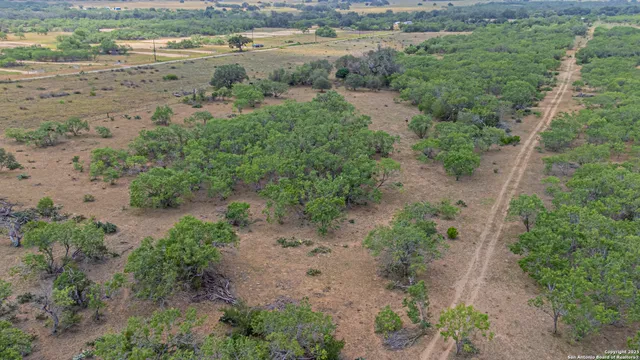 an aerial view of beach and space
