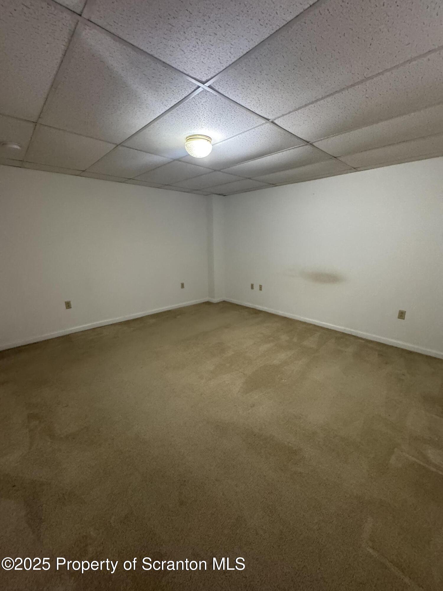 622 Terrace Street, Unit B Dunmore, PA 18512 - Photo 11 of 15 an empty room with a empty space