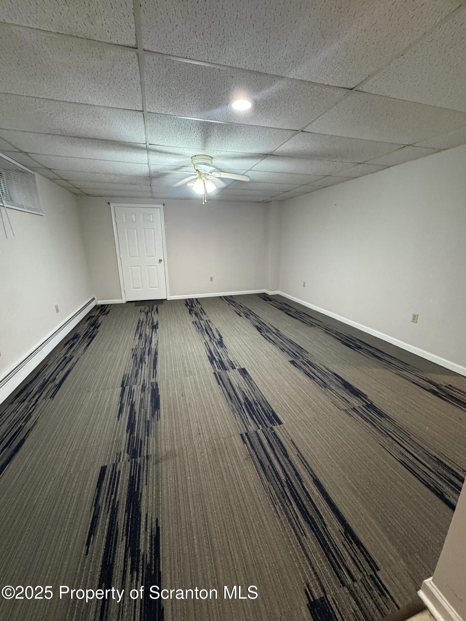 622 Terrace Street, Unit B Dunmore, PA 18512 - Photo 5 of 15 a view of a room with wooden floor