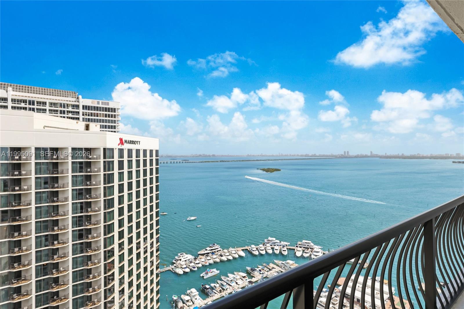 555 Northeast 15th Street, Unit 33G Miami, FL 33132 - Photo 11 of 18 a view of a balcony with a floor to ceiling window