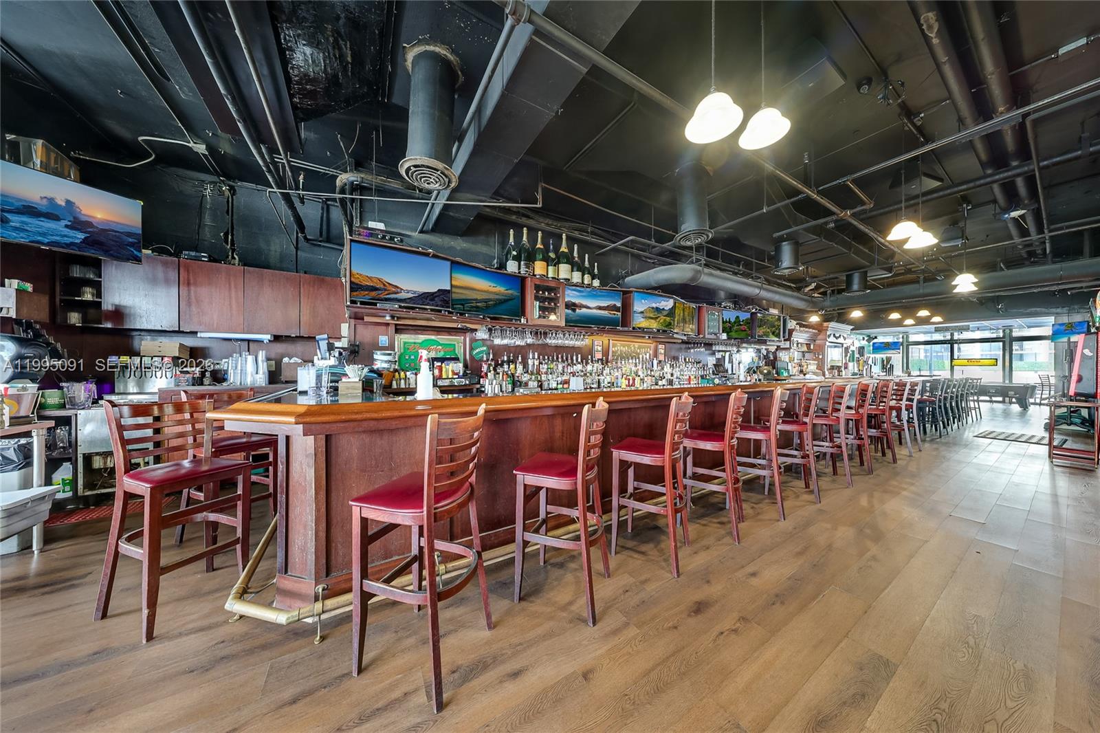 555 Northeast 15th Street, Unit 33G Miami, FL 33132 - Photo 13 of 18 a view of a bar restaurant
