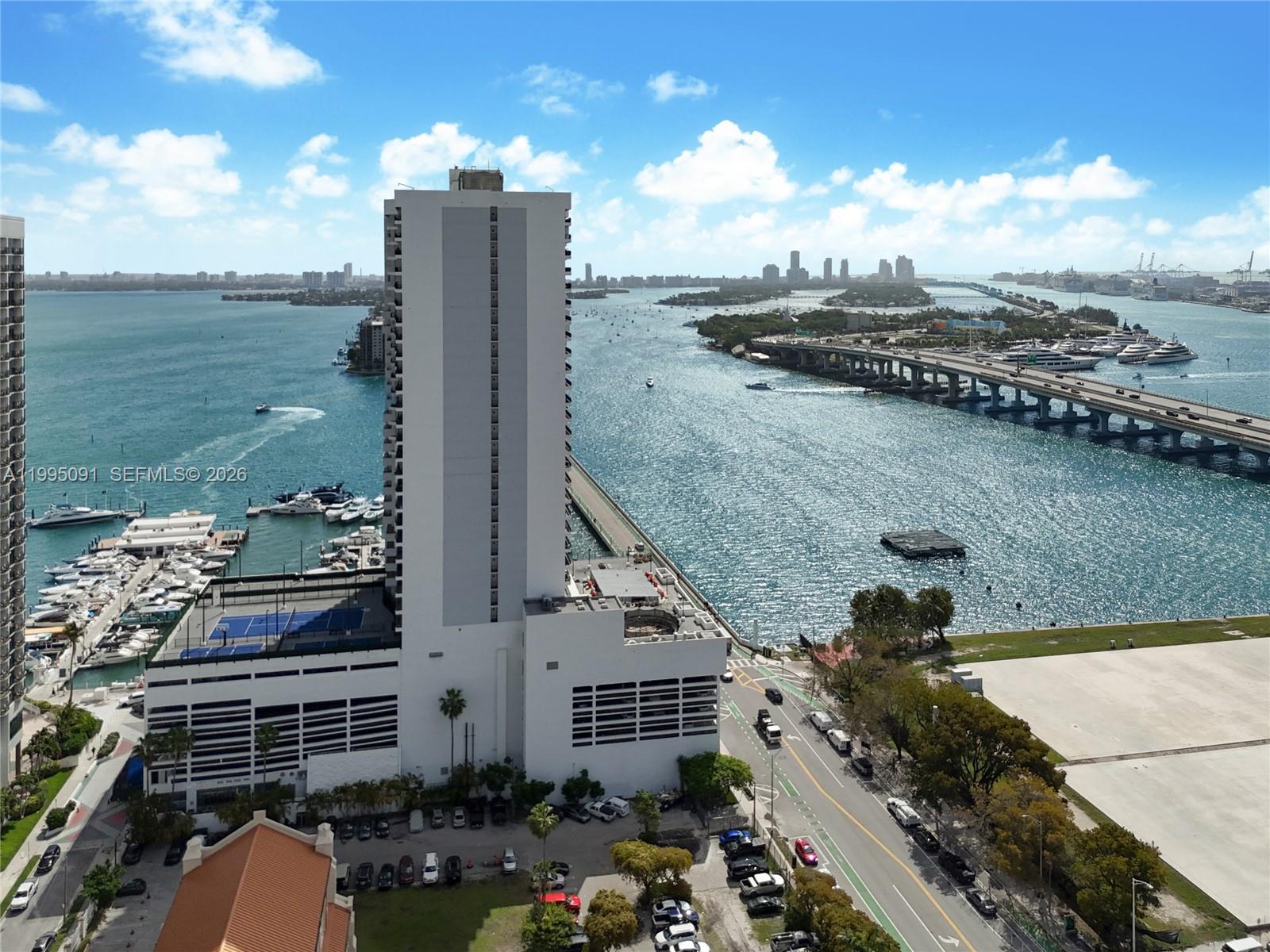 555 Northeast 15th Street, Unit 33G Miami, FL 33132 - Photo 16 of 18 a view of a city and an ocean view