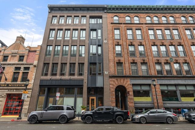 a car parked in front of a building