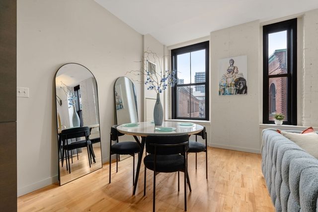 a view of a livingroom with furniture and window