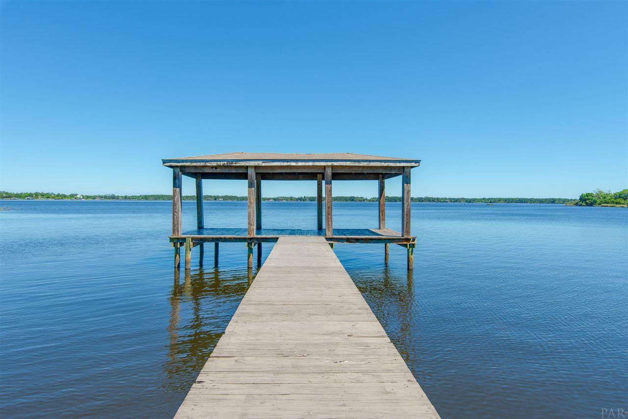 7636 Old Bay Pointe Road Milton, FL 32583 - Photo 1 of 50 Enjoy morning coffee or afternoon tea