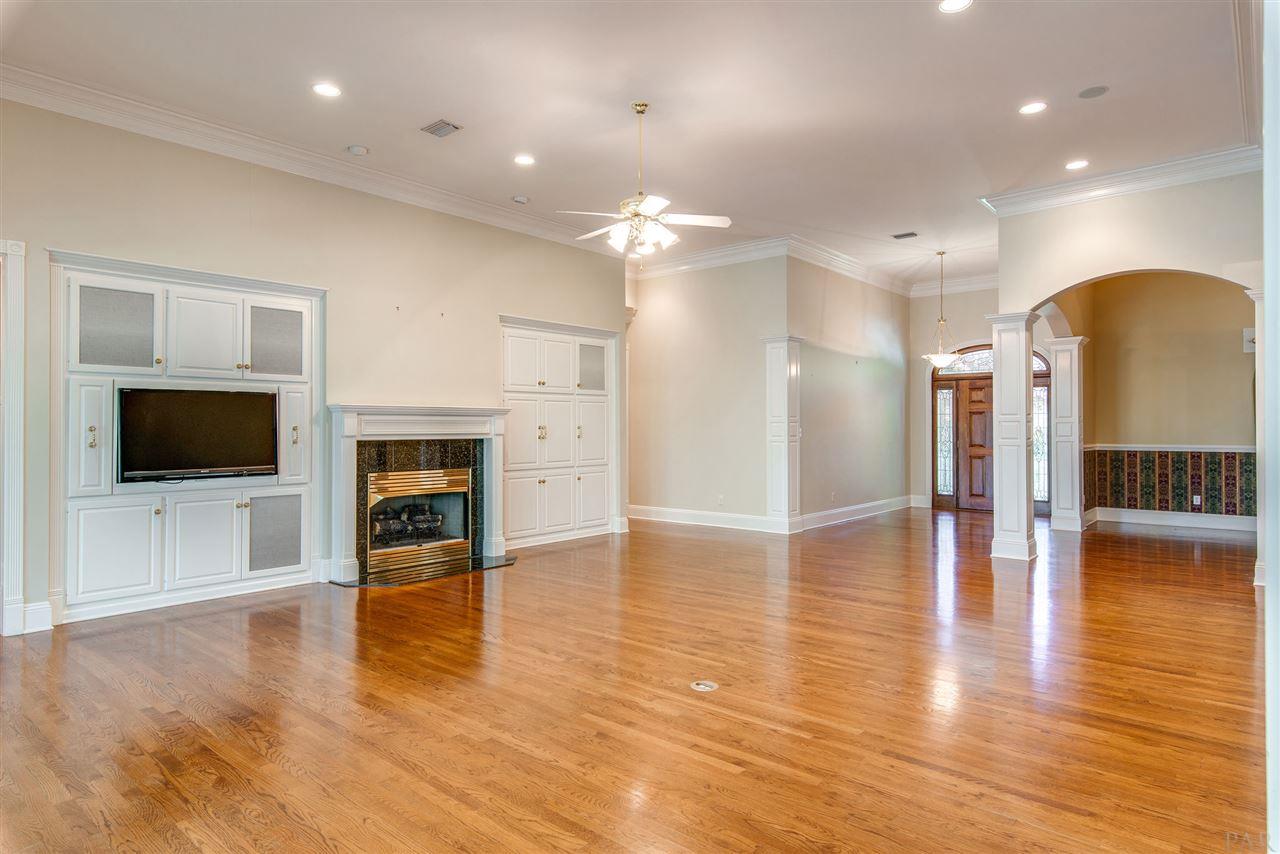 7636 Old Bay Pointe Road Milton, FL 32583 - Photo 19 of 50 Built-ins, fireplace, formal dining