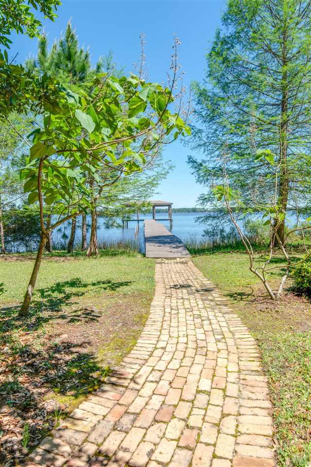 7636 Old Bay Pointe Road Milton, FL 32583 - Photo 4 of 50 Beautiful brick walkway leading to dock