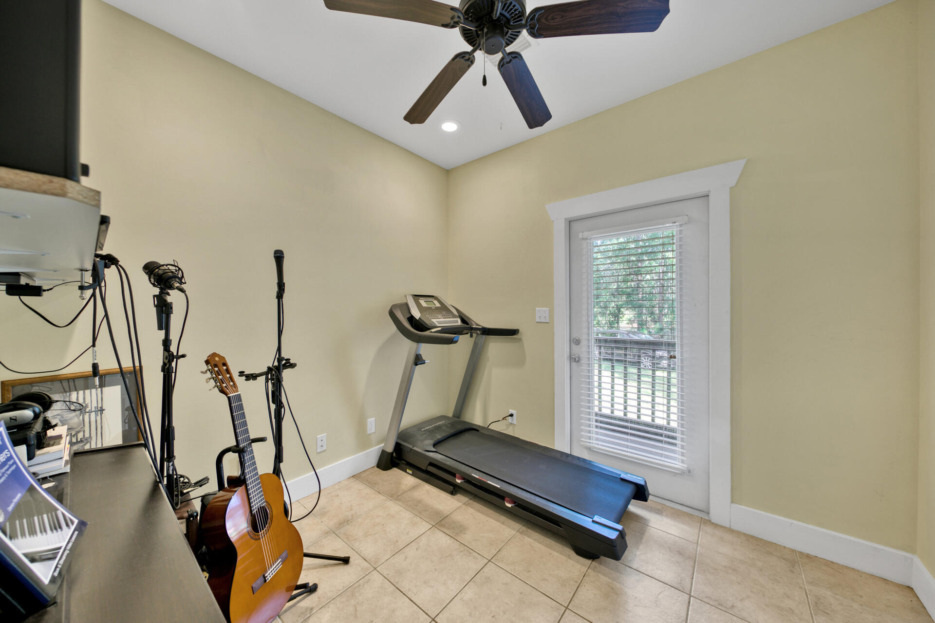 523 Mallet Bayou Road Freeport, FL 32439 - Photo 14 of 22 a room with gym equipment and windows