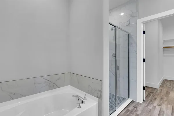 a bathroom with a sink double vanity and a mirror