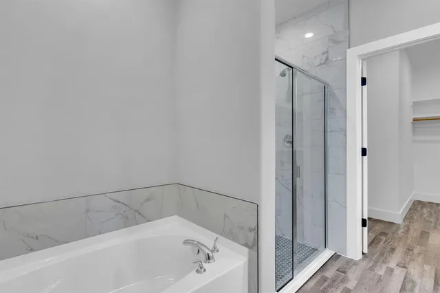 a bathroom with a sink double vanity and a mirror