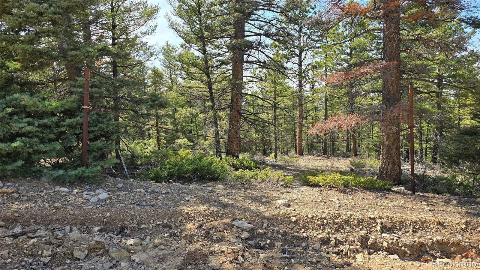 Lot 6070 Vreeland Road San Luis, CO 81152 - Photo 5 of 25 a backyard of a house with lots of green space