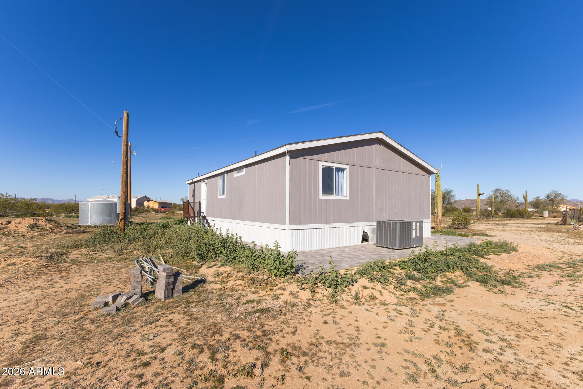 54073 West Stallion Road Maricopa, AZ 85139 - Photo 17 of 23 a view of a backyard of the house