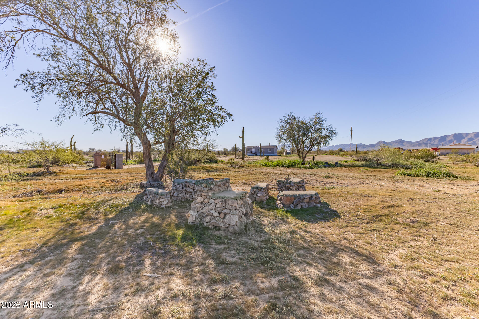 54073 West Stallion Road Maricopa, AZ 85139 - Photo 19 of 23 a view of a lake with houses