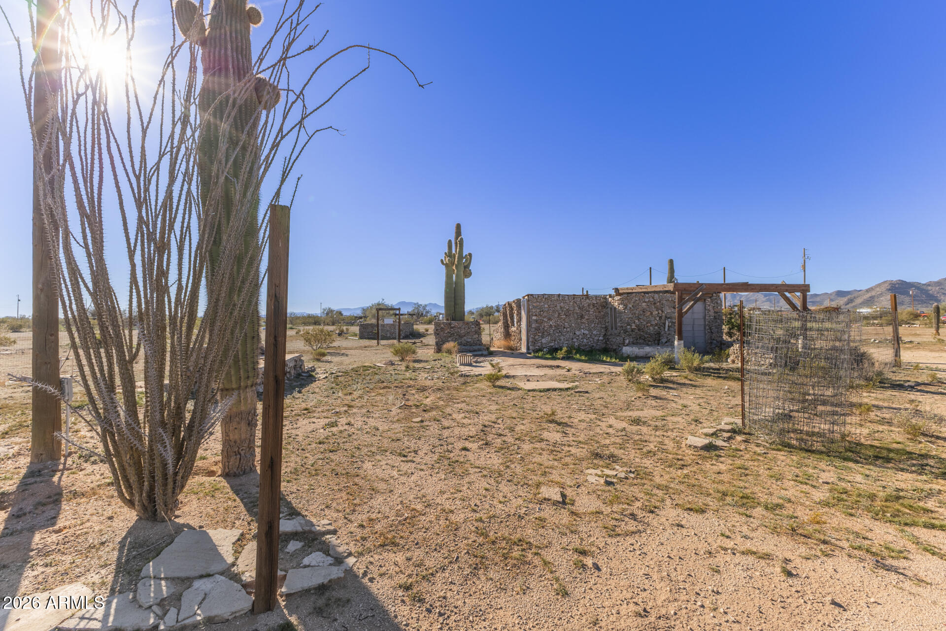 54073 West Stallion Road Maricopa, AZ 85139 - Photo 20 of 23 a view of a backyard of the house