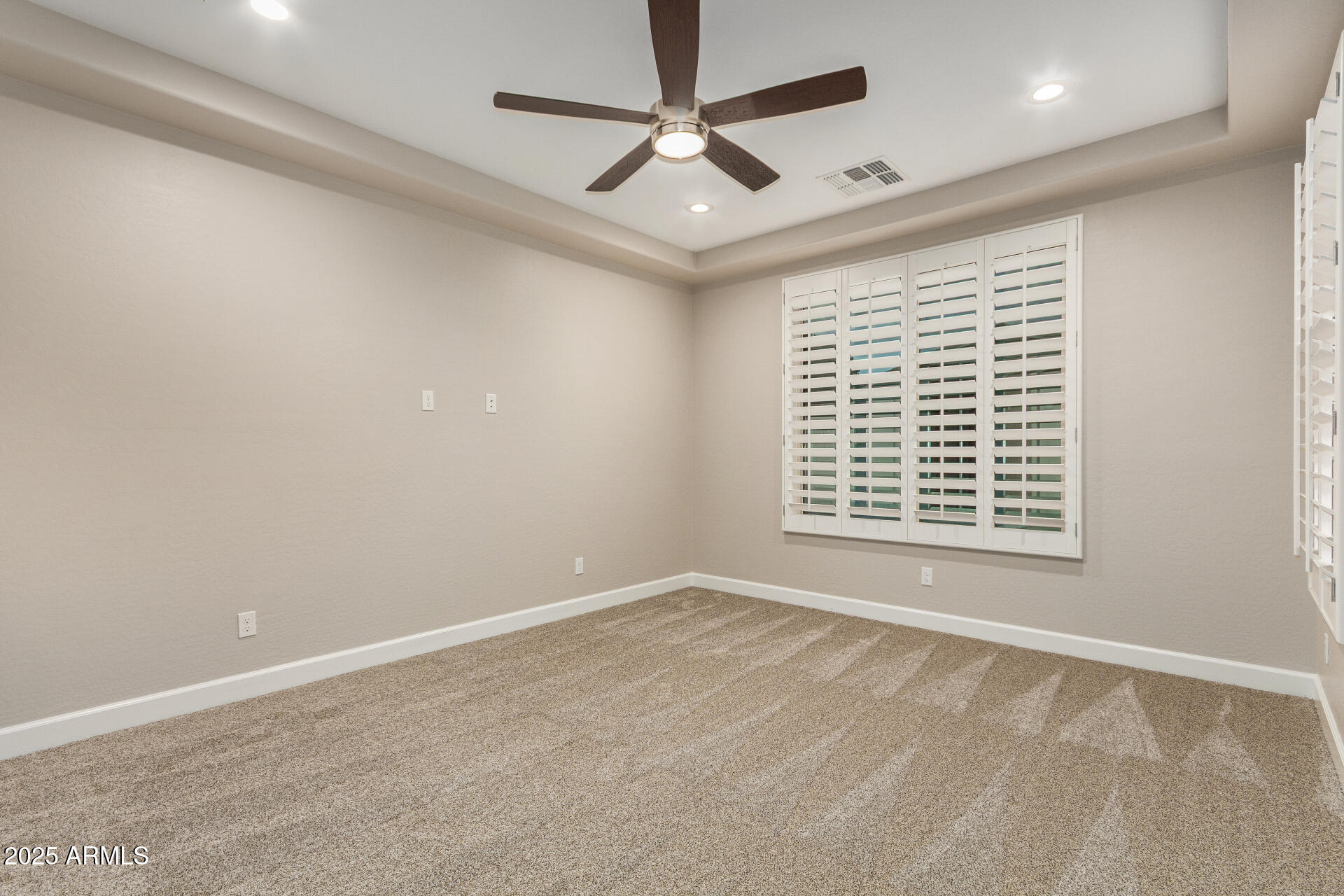 4312 East Rawhide Street Gilbert, AZ 85296 - Photo 11 of 24 a view of an empty room with a window