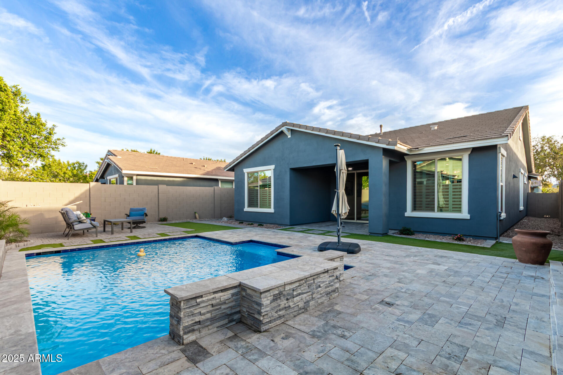 4312 East Rawhide Street Gilbert, AZ 85296 - Photo 21 of 24 a front view of a house with garden