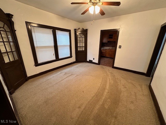 1612 Hillcrest Road Cleveland, OH 44118 - Photo 7 of 29 Unfurnished bedroom featuring light colored carpet and ceiling fan