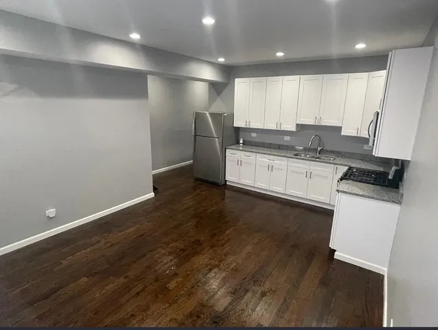 a front view of a house with garage