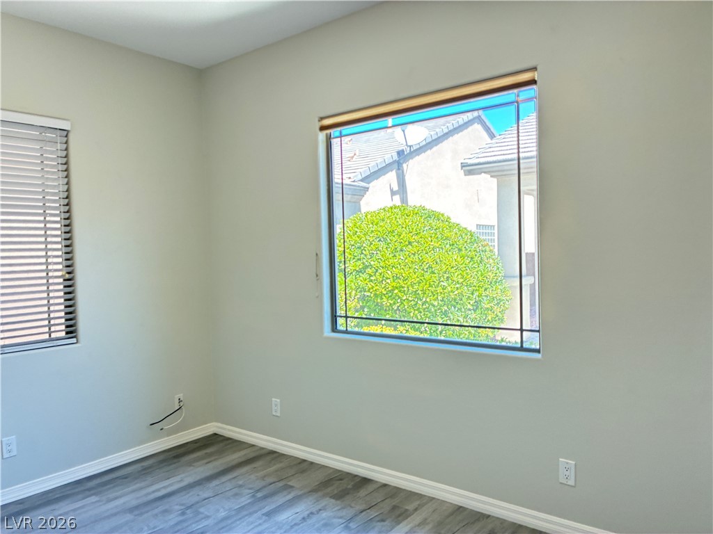 10 Caprington Road Henderson, NV 89052 - Photo 42 of 44 Natural light filters into this simple room, highlighting its smooth flooring and clean lines.