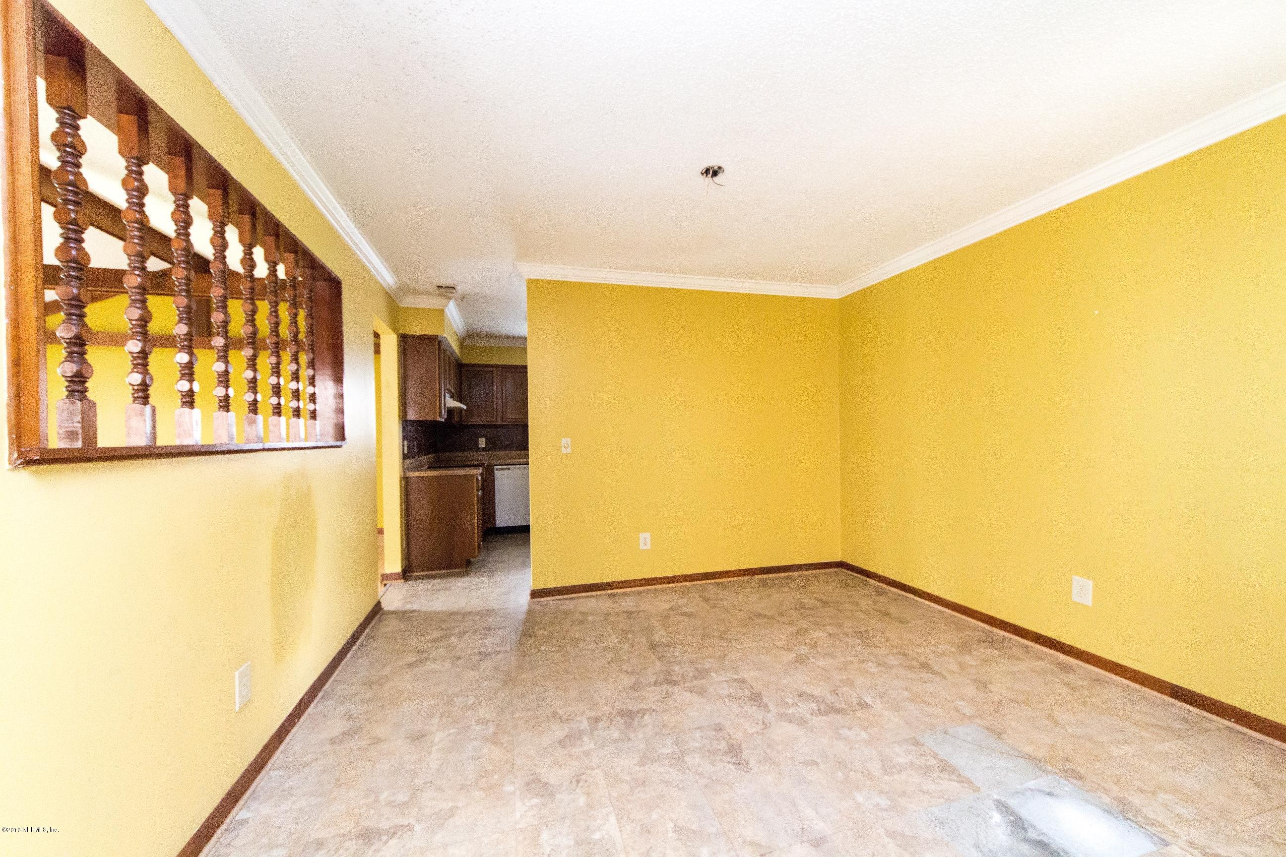 10852 Reading Road Jacksonville, FL 32257 - Photo 11 of 30 a view of an empty room with a window