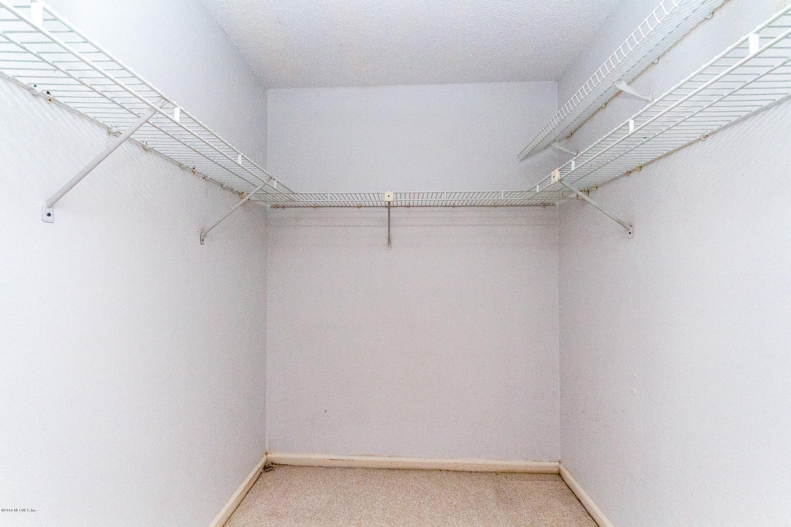 10852 Reading Road Jacksonville, FL 32257 - Photo 17 of 30 a view of an empty walk in closet