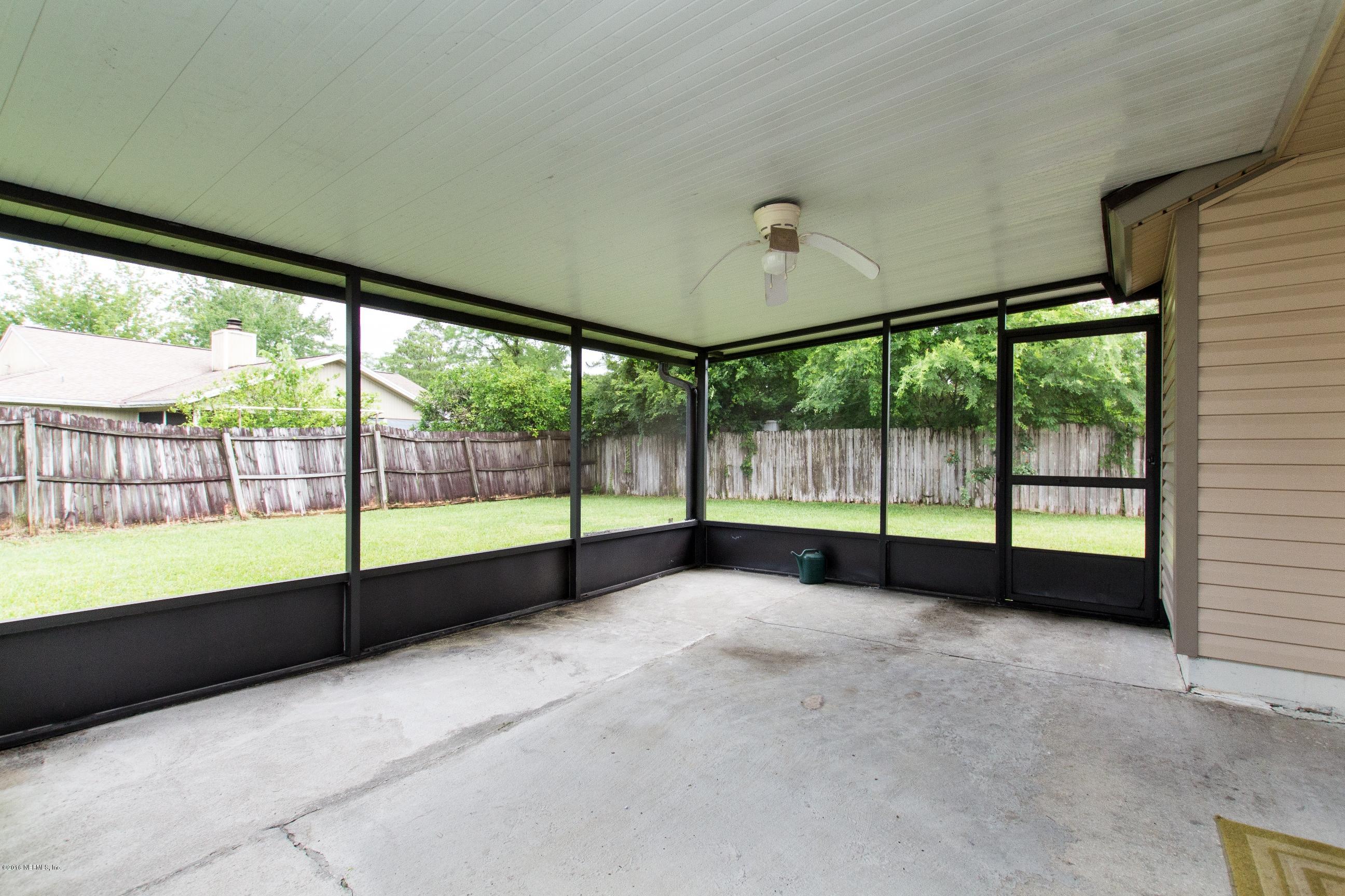 10852 Reading Road Jacksonville, FL 32257 - Photo 23 of 30 a view of an empty room with a large window