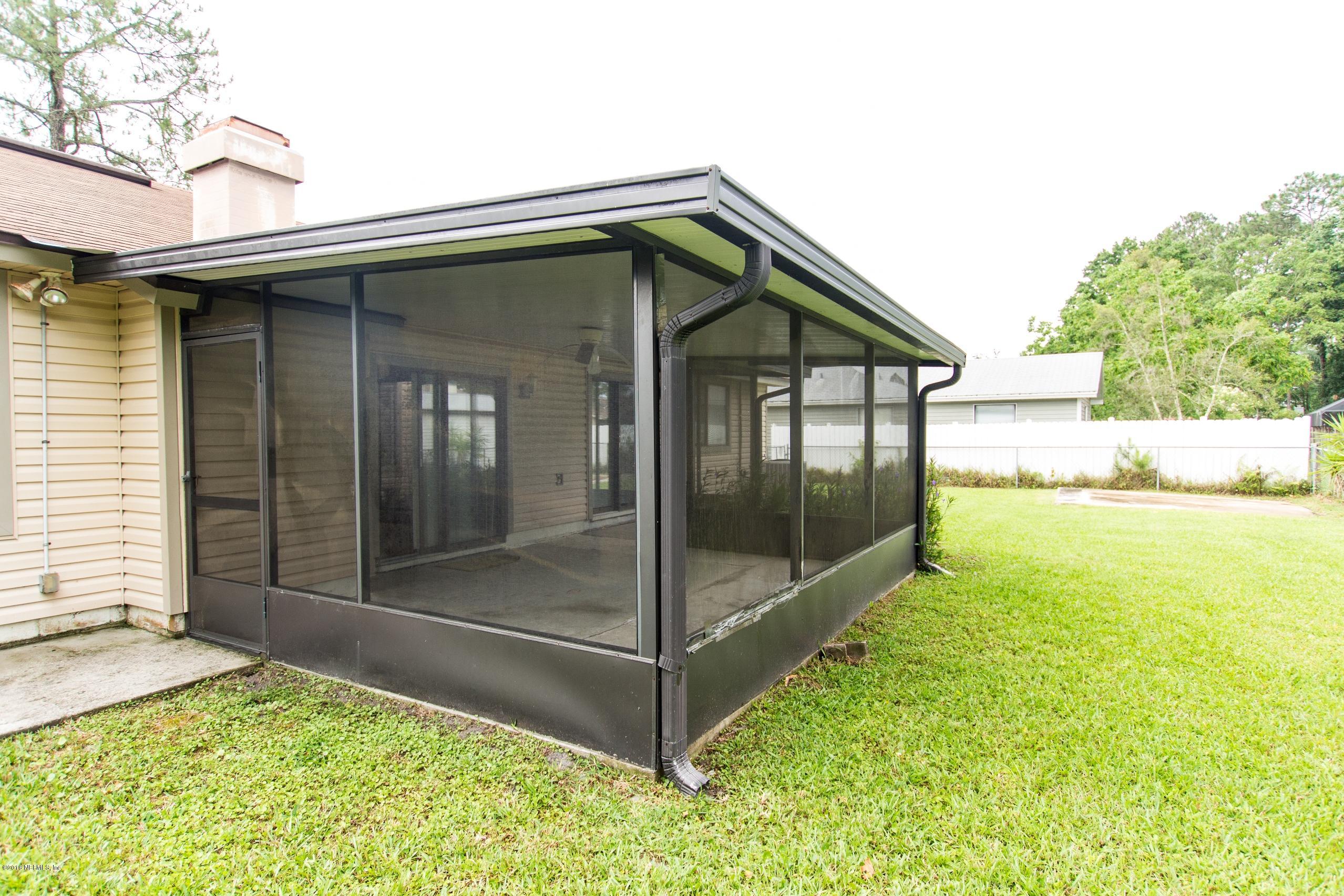 10852 Reading Road Jacksonville, FL 32257 - Photo 24 of 30 a view of house with backyard