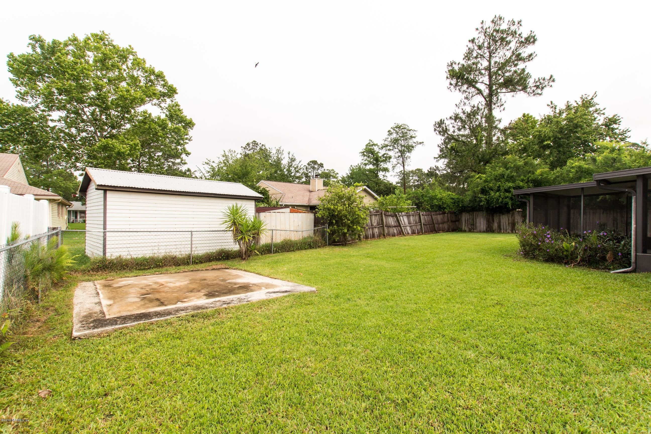 10852 Reading Road Jacksonville, FL 32257 - Photo 29 of 30 a view of backyard of house with wooden fence