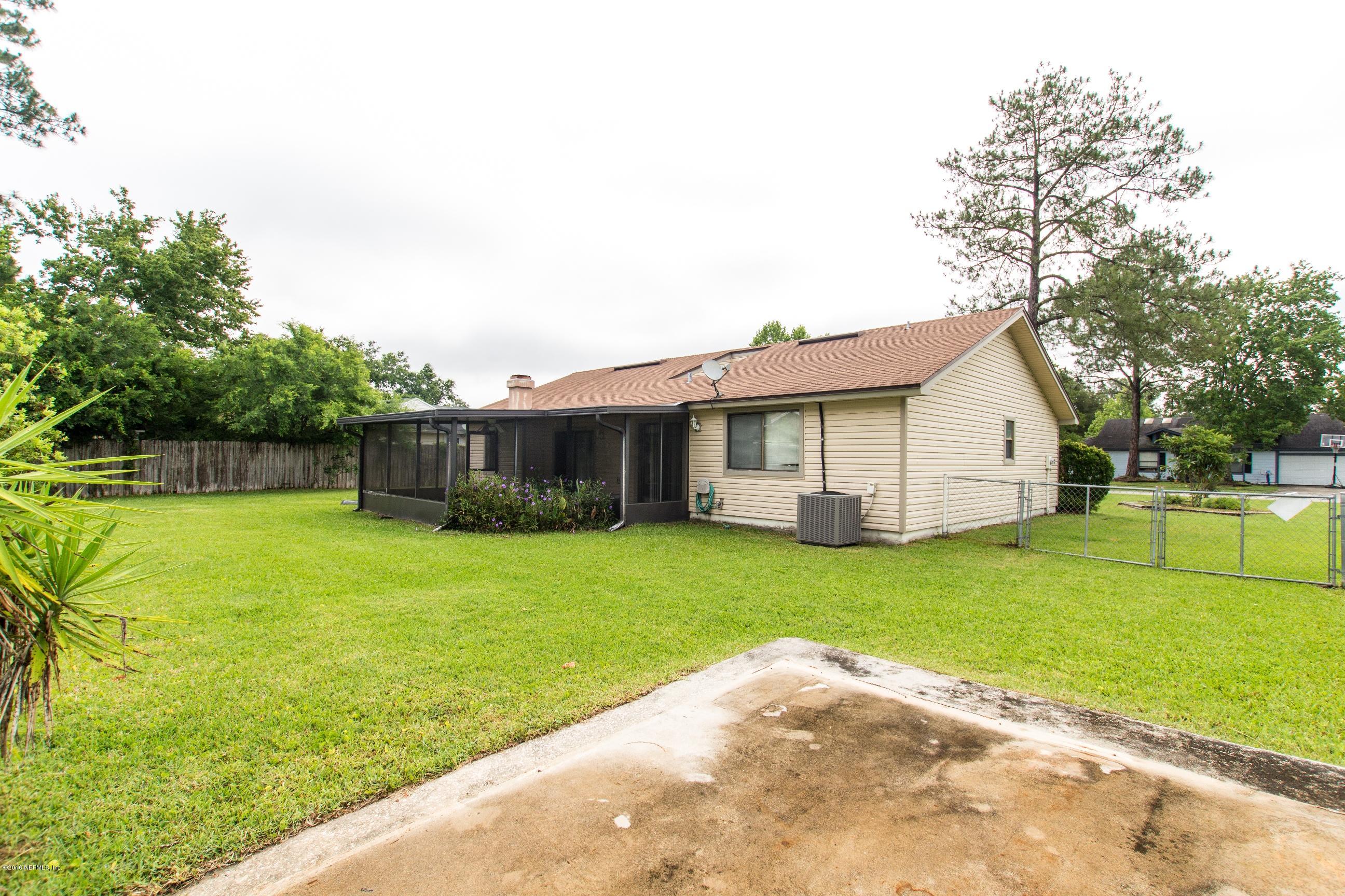 10852 Reading Road Jacksonville, FL 32257 - Photo 30 of 30 a view of a house with backyard and garden