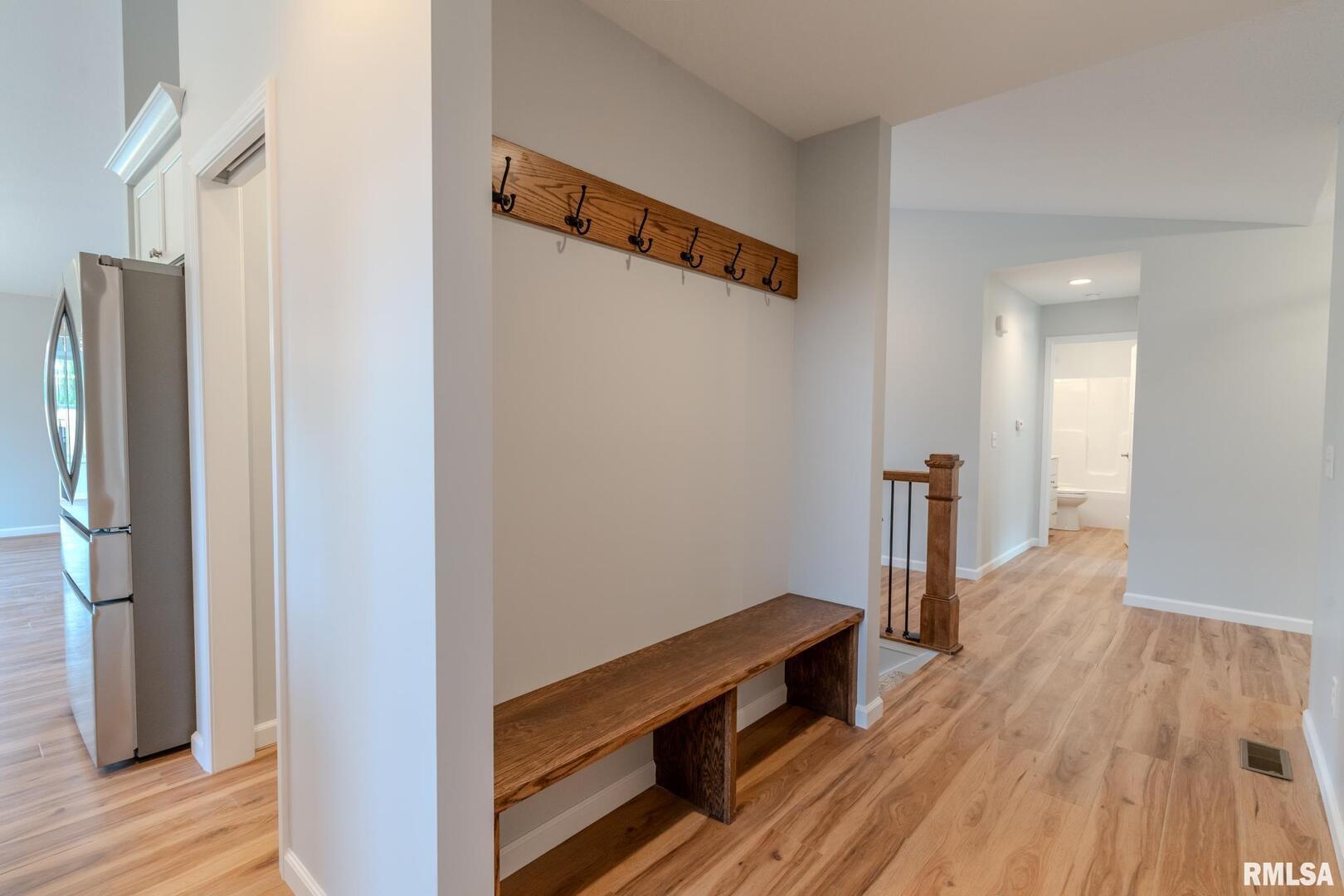 941 9th Avenue North Clinton, IA 52732 - Photo 9 of 24 a view of hallway with wooden floor