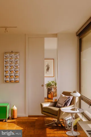 a bedroom with a bed and a night stand