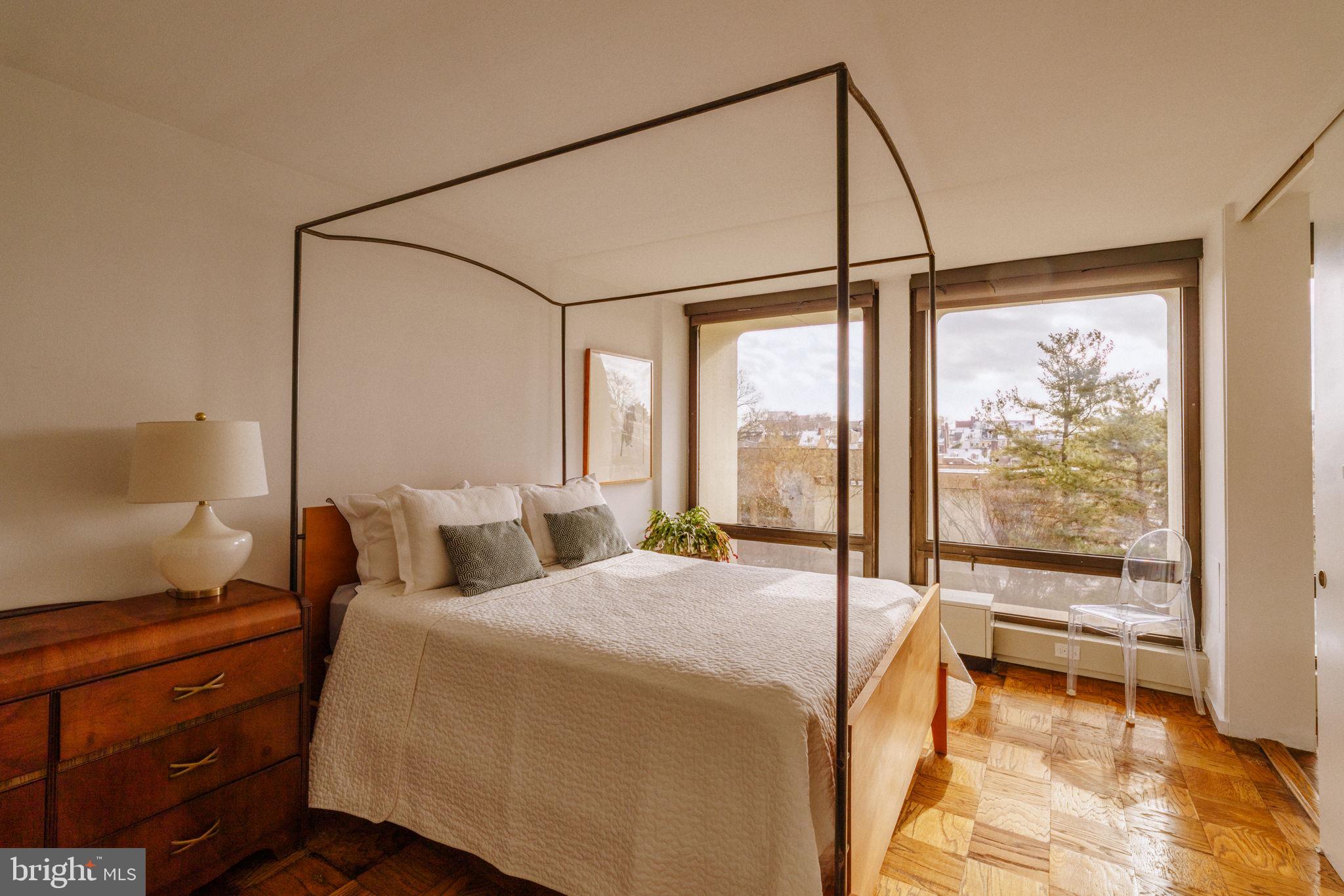 220 Locust Street, Unit 2GS Philadelphia, PA 19106 - Photo 14 of 42 a bedroom with a bed and a night stand