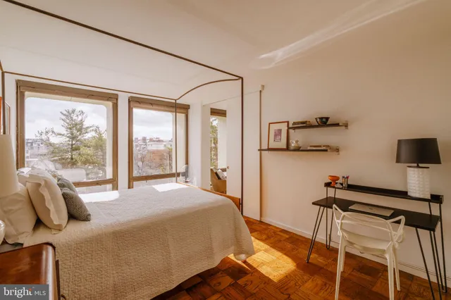 a room with furniture and a flat screen