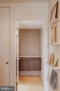 a bathroom with a tub and shower