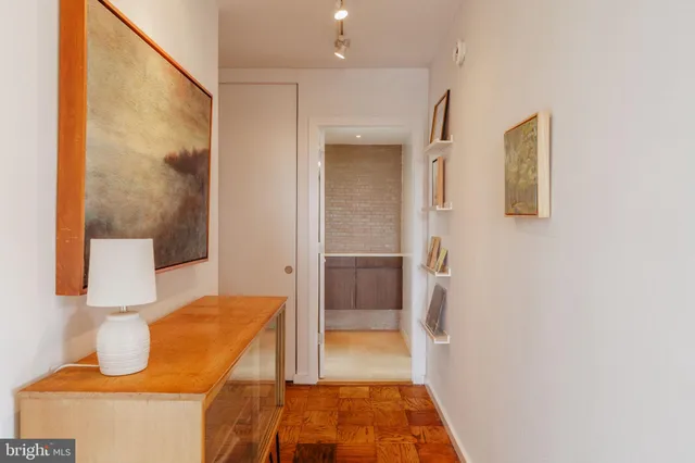 a room with furniture and wooden floor