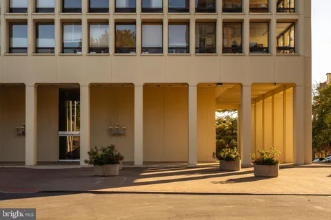 a view of a backyard with sitting area and furniture