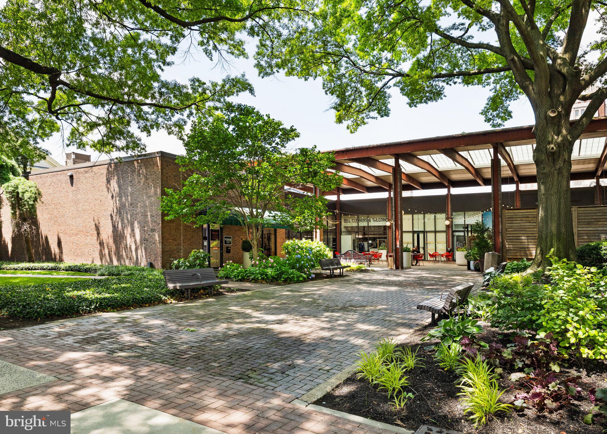 220 Locust Street, Unit 2GS Philadelphia, PA 19106 - Photo 31 of 42 a view of a house with a tree and pathway