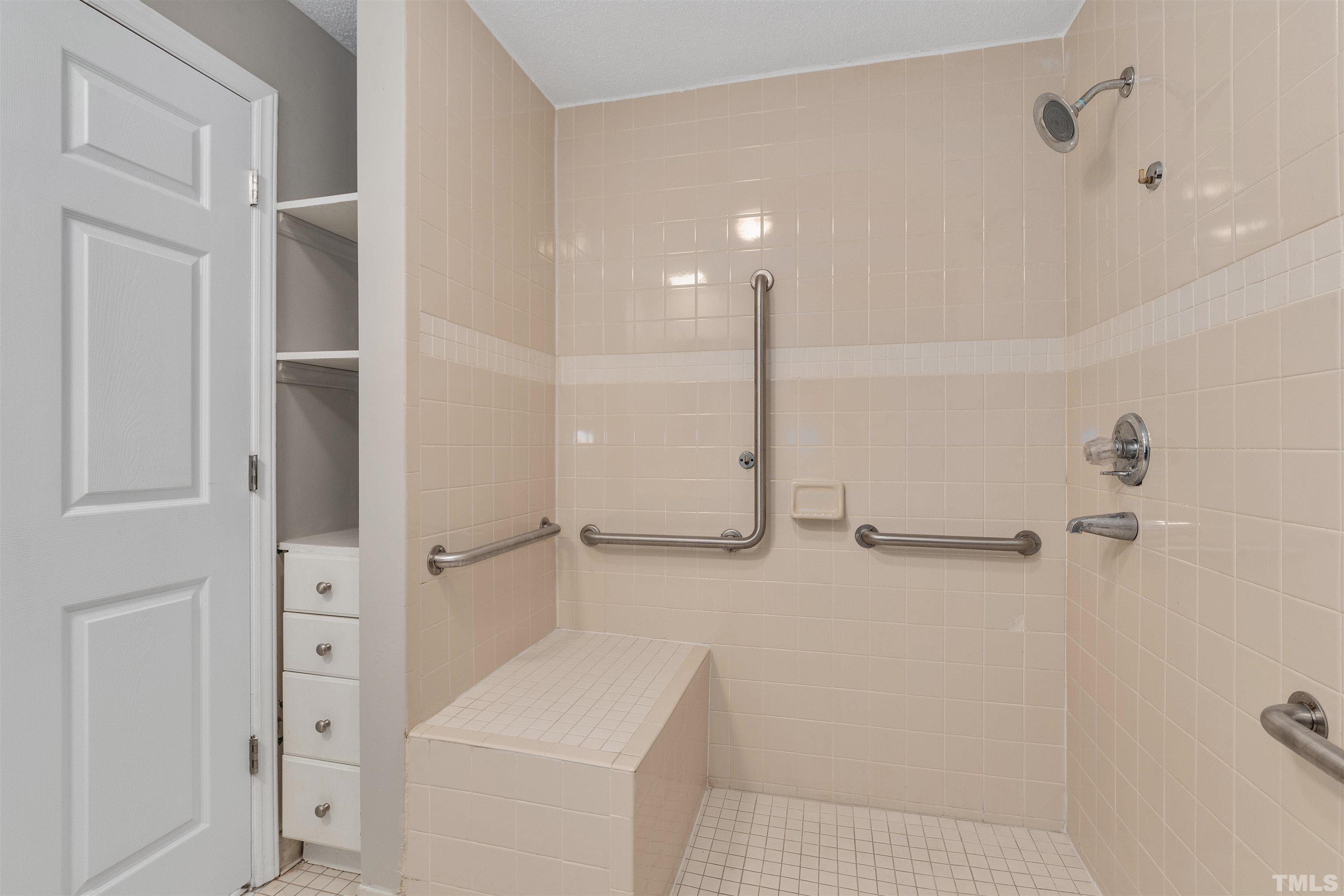 5630 Fairground Road Dunn, NC 28334 - Photo 16 of 33 a bathroom with a sink a toilet and shower