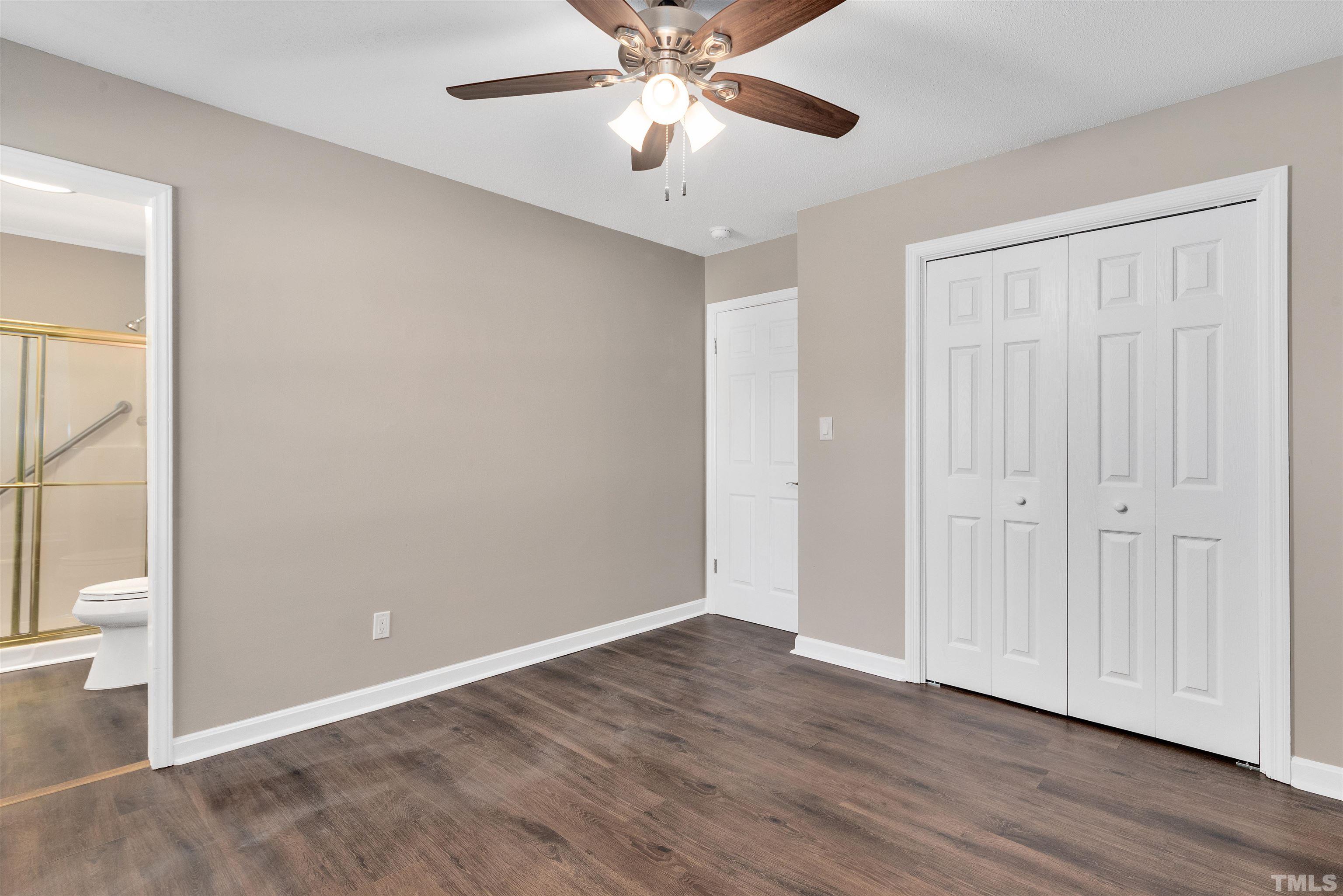 5630 Fairground Road Dunn, NC 28334 - Photo 22 of 33 wooden floor in an empty room with a window