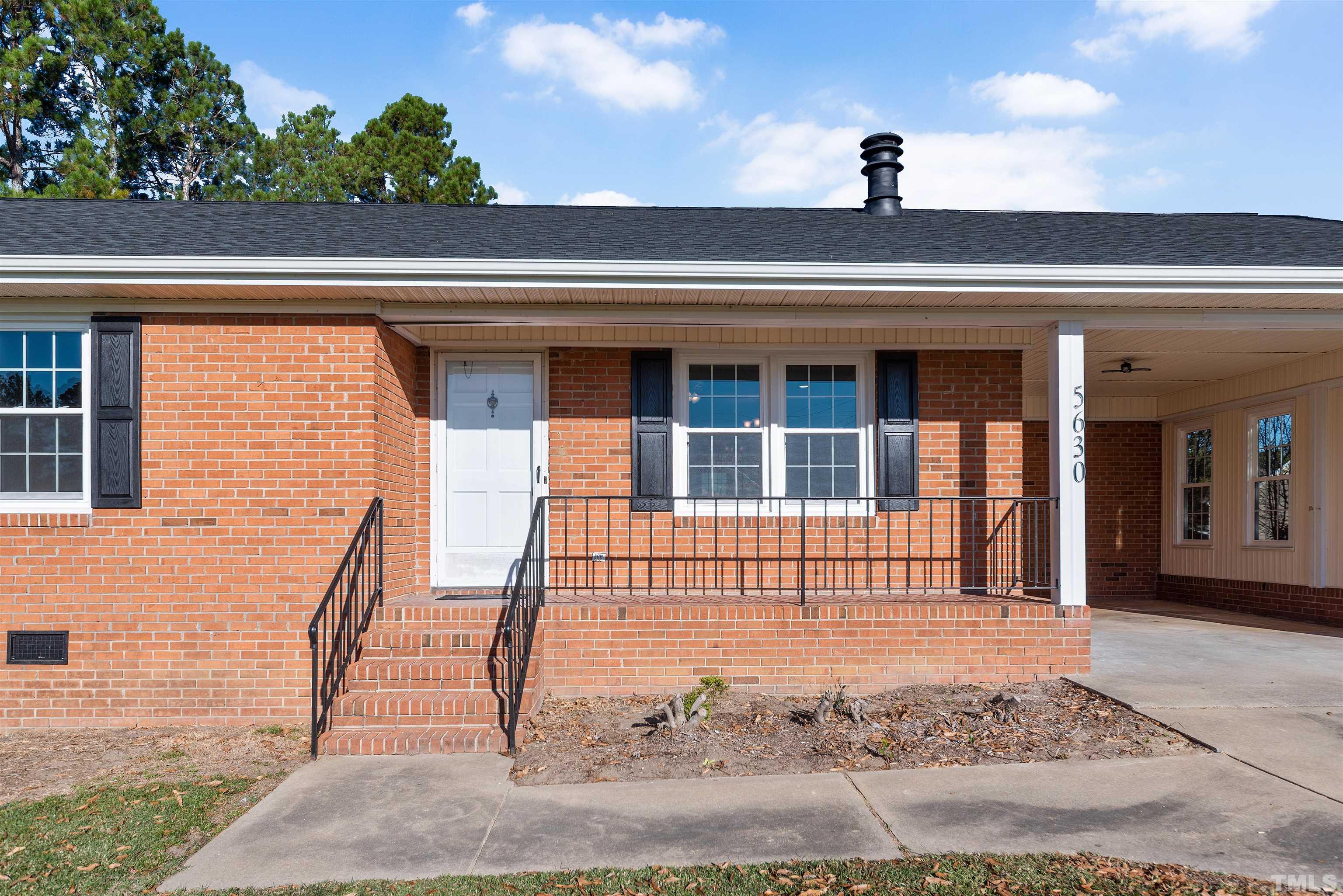 5630 Fairground Road Dunn, NC 28334 - Photo 28 of 33 a front view of a house