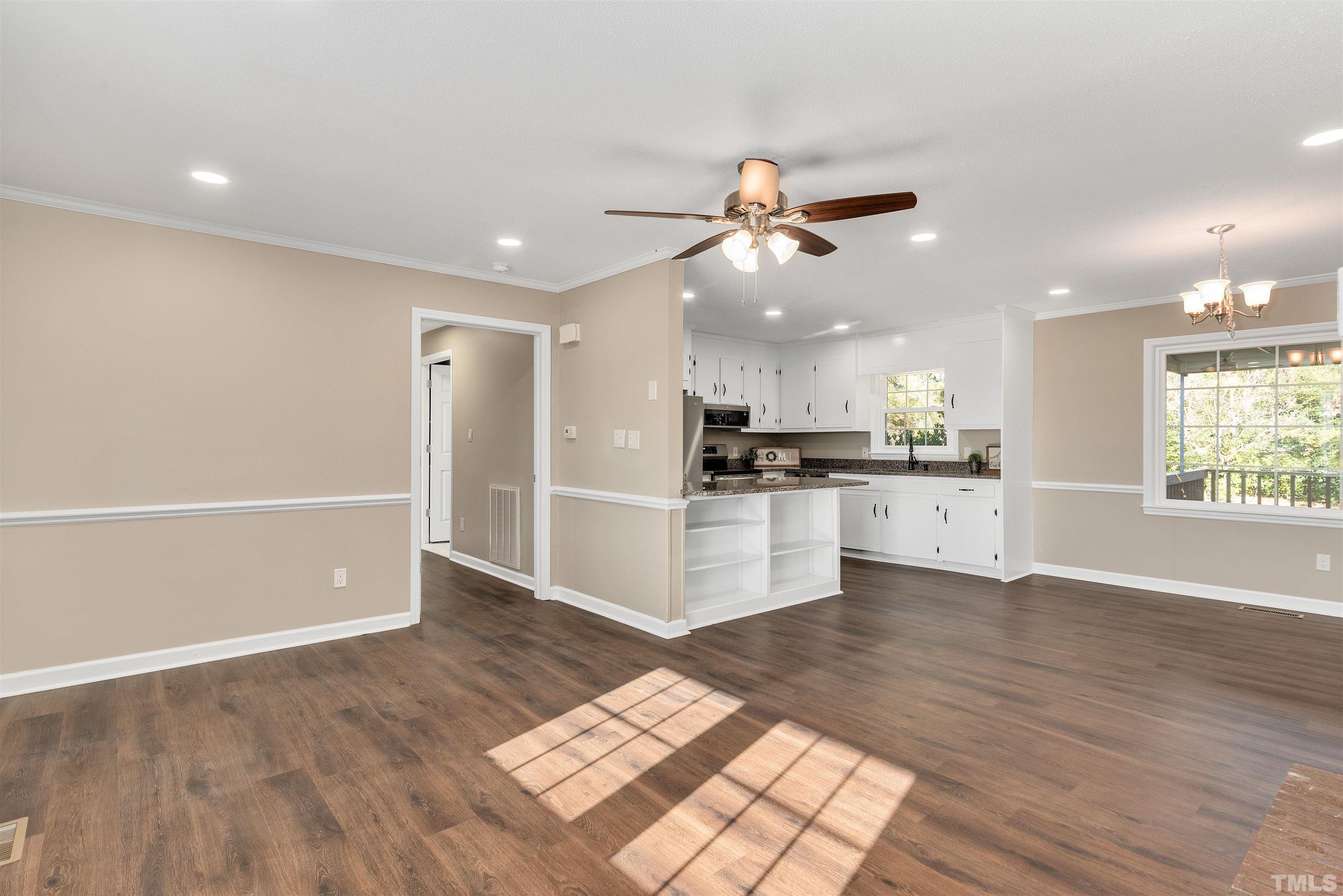 5630 Fairground Road Dunn, NC 28334 - Photo 7 of 33 a view of kitchen with refrigerator and window