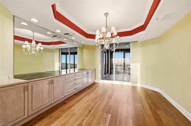 a view of a bathroom with dual sinks