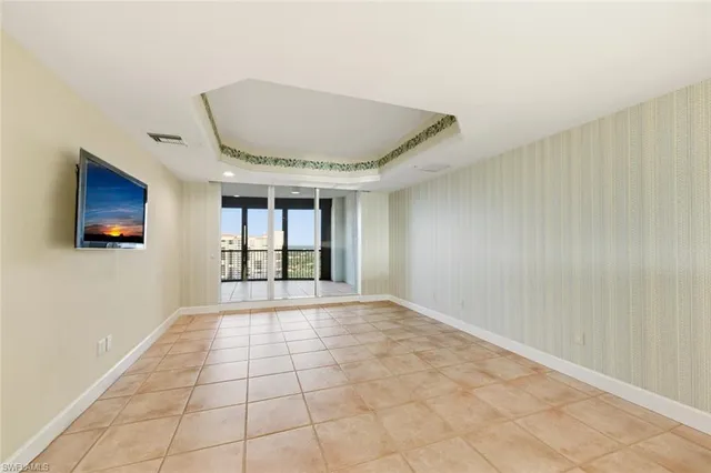 a view of a room with windows