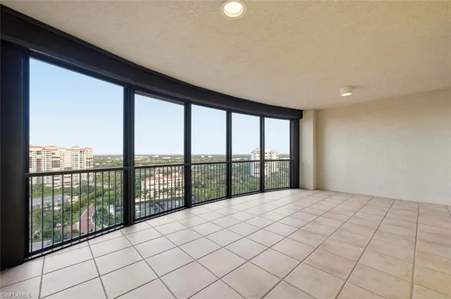 a spacious bathroom with a sink a large mirror and a bath tub