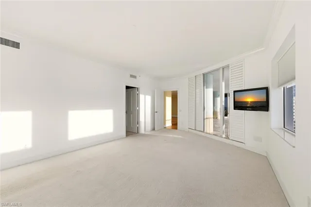 a view of an empty walk in closet