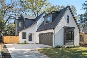 206 Mead Road Decatur, GA 30030 - Photo 5 of 9 a front view of a house with a yard and garage