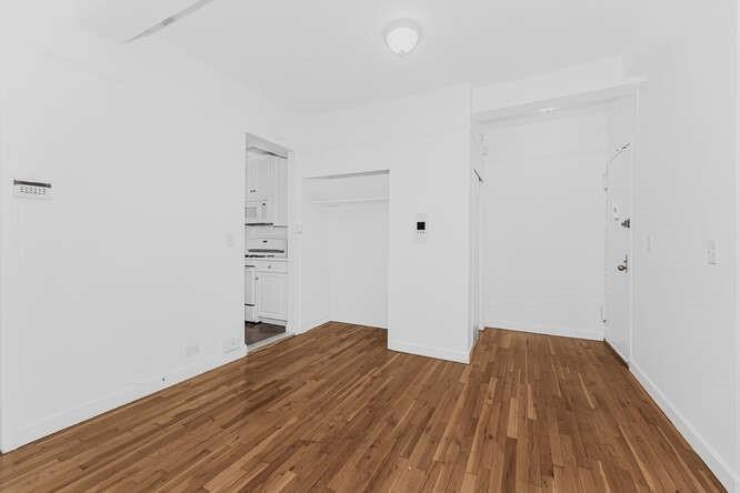 2750 Johnson Avenue, Unit 3H Bronx, NY 10463 - Photo 8 of 12 Unfurnished room with wood finished floors