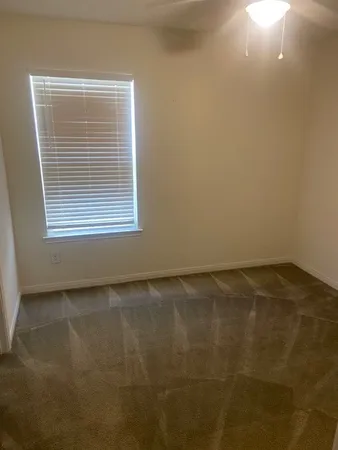 a view of an house with backyard